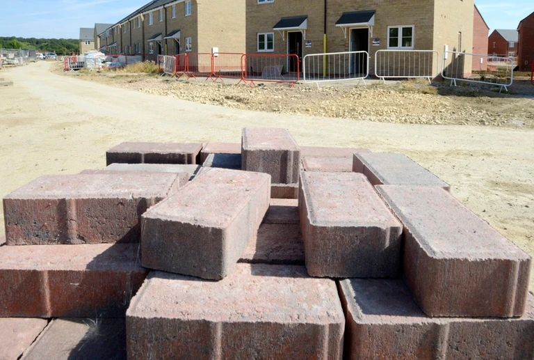 Bricks and a new build house