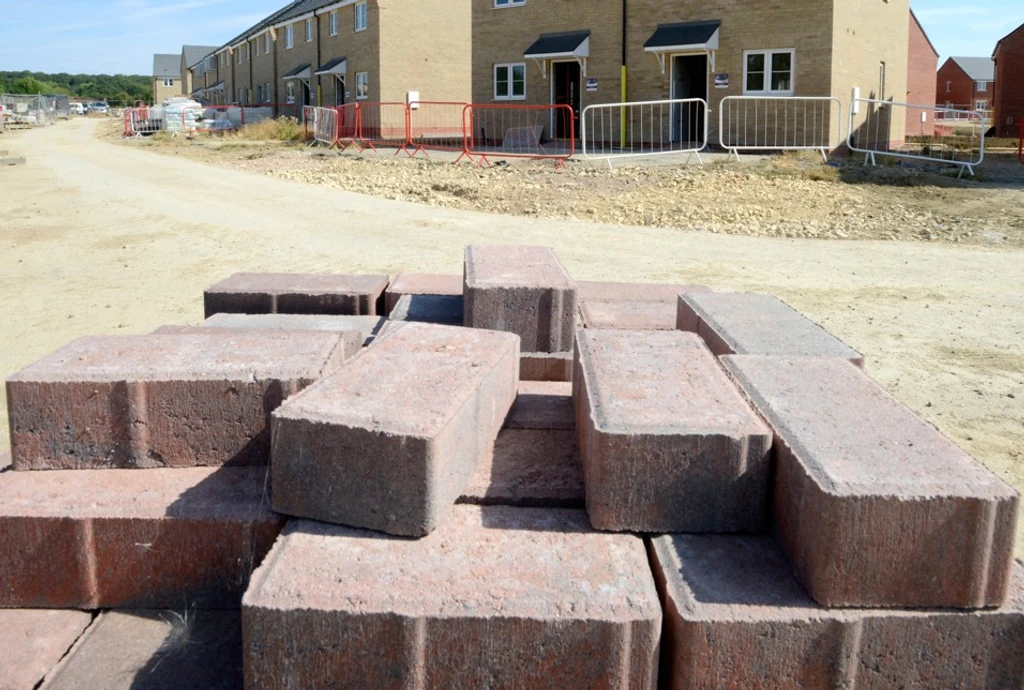 Bricks and a new build house