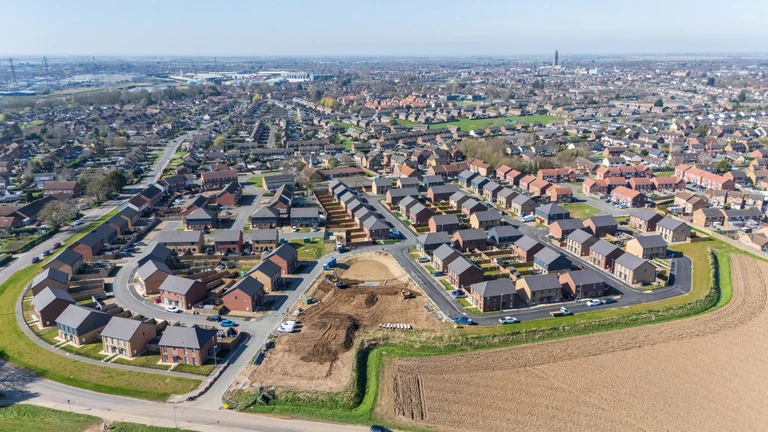 An aerial view of a new build housing estate.